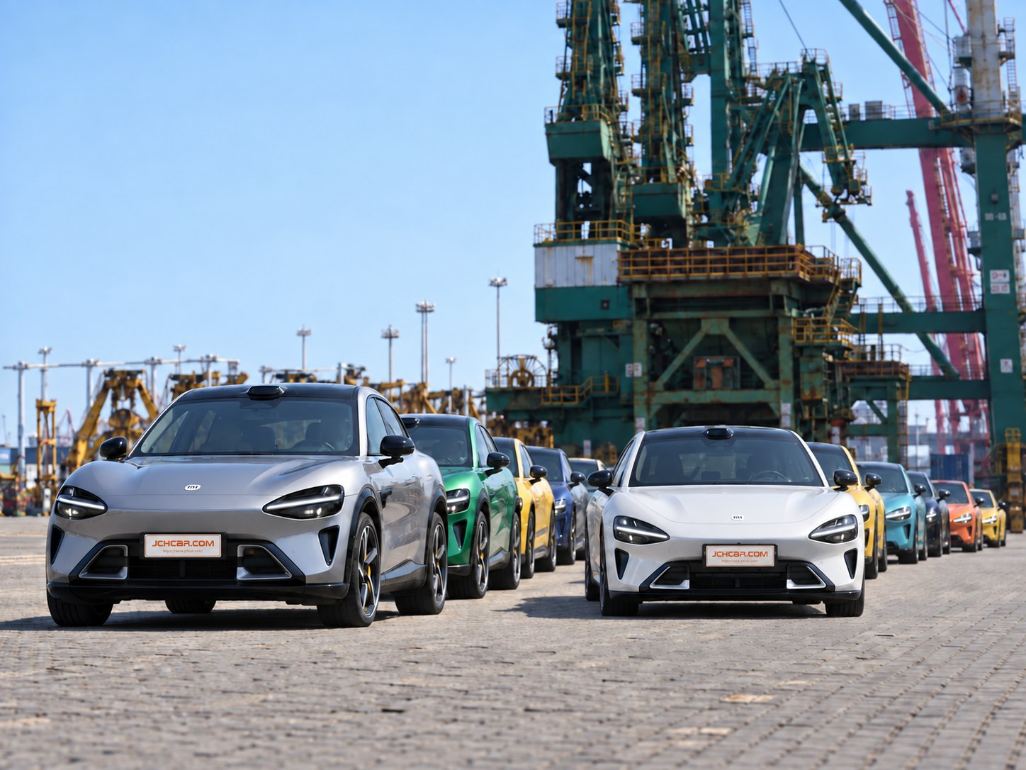 Xiaomi cars lined up at a China export port, with container cranes behind the row